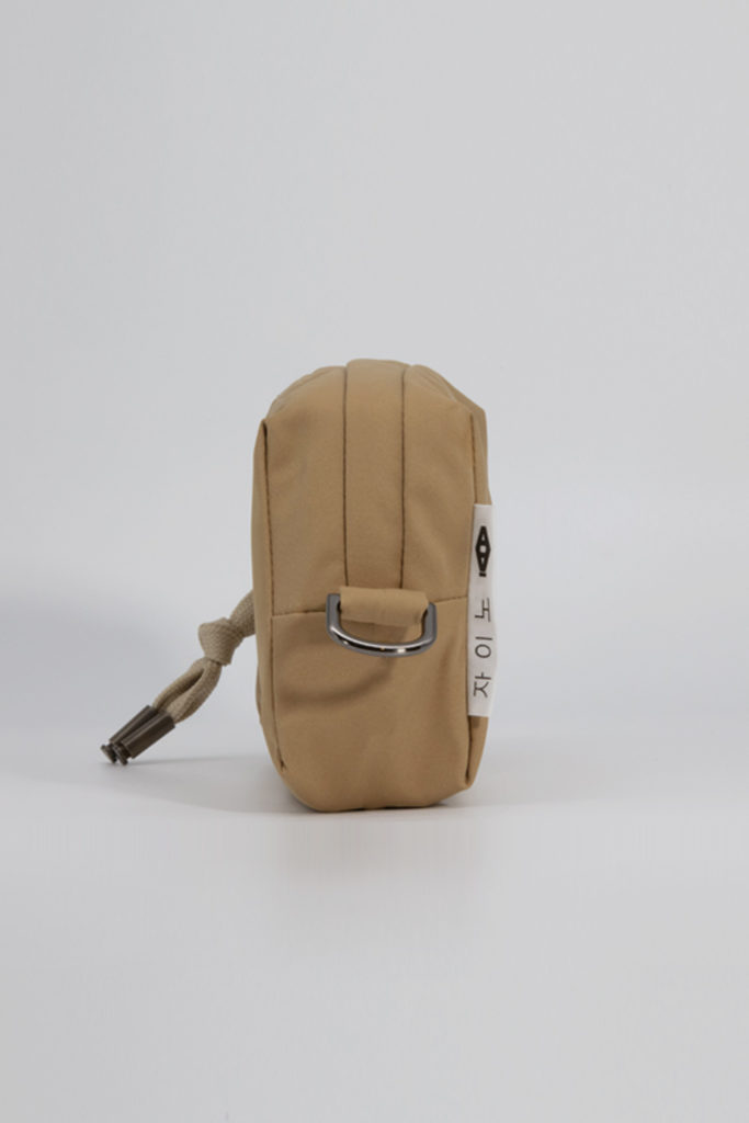 APA Travel Pouch, upcycled waterproof travel pouch in Beige Caramel